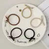 Estilo Floresta Simples Versátil Elástico para Cabelo Mola Amarrado Corda de Cabelo com Fio Alta Elasticidade Durável Rabo de Cavalo Corda de Cabelo Feminina Faixa de Cabelo