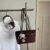 Bolso retro mate de alta gama para mujer 2026 nuevo elegante versátil bandolera única bolso de axila bolso de mano tote bolsa cubo