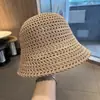 Sombrero de pescador de punto hueco de color sólido estilo japonés para mujer, sombrero de protección solar de ala ancha para primavera y verano, sombrero de ala para adelgazar la cara