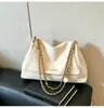 Bolso de gamuza vintage relajado 2026 nuevo modelo versátil bandolera para mujer de uso diario bolsa de mano simple para el trabajo