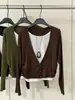 Camiseta de manga larga de color liso estilo coreano, una nueva colección de otoño con corte holgado, efecto adelgazante y diseño versátil, disponible en tallas grandes para mujer