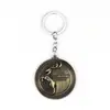 Periféricos de Anime Transfronterizos Juego de Tronos 9 Insignias de las Casas Principales Metal Llavero de Coche Colgante Accesorios Dropshipping