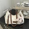 Bolso de mano de estilo coreano con diseño de nicho, exquisito, para mujer, primavera 2025, nuevo, moderno, de gran capacidad, para ir al trabajo.