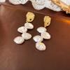 Pendientes circulares de perlas con aguja de plata, pendientes artísticos retro antiguos, pendientes ligeros de lujo de alta gama con temperamento, venta al por mayor