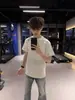 Marca Americana Moderna T-shirt de Manga Curta Bordada com Letras Masculina Verão Ensino Fundamental Médio Estudantes Jovens Gola Redonda Top ins
