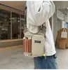Bolsa para botella de agua de deportes al aire libre transfronteriza, ligera y elegante, bolso de hombro con bloques de color, bolso cruzado casual multifuncional para teléfono de senderismo