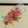 Barril a granel banda de goma desechable banda de goma para niños trenza para niños banda de goma de color transparente desechable anillo para el cabello