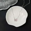 Collar de mariposa de cristal de fresa diseño de nicho de lujo ligero cadena de clavícula de alta calidad femenina estilo simple de verano nueva moda temperamento