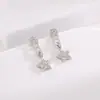 Nuevos Pendientes de Clip para Papel con Forma de Estrella de Diamante Pequeños y Exquisitos Estilo Fresco Femenino Simple Pendientes de Estrella de Cinco Puntas Venta al por Mayor