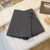 Nuevos pantalones-falda de estilo chino con lazo para mujer, verano anti-exposición, pantalones-falda cortos irregulares de cintura alta en línea A adelgazantes