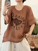 Camiseta de Linho Tingido em Fio com Estampa, Manga Curta, Gola Redonda, Corte Solto, Emagrecimento, Versátil, Estilo Casual e Relaxado - Nova Peça de Verão