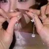 Pendientes de mariposa de circón estilo ins coreano, pendientes de borla de ojo de gato a la moda y lujosos, pendientes delicados y sofisticados