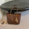 Bolso tote transfronterizo nuevo de gran capacidad, diseño moderno y minimalista, bolso de hombro casual para mujer, elegante y práctico para ir al trabajo