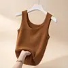 Directo del FabricanteCamiseta sin mangas acanalada de talla grande para mujer, corte ajustado, para verano, adecuada para usar sola o en capas, chaleco sin mangas