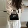 Bolsa pequena elegante de alta qualidade para mulheres 2026 nova popular bolsa transversal versátil bolsa mini da moda bolsa quadrada pequena