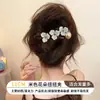 Pinza para el pelo de flor marrón retorcida para mujer, nuevo modelo 2026, sensación de alta gama, pinza de garra para el pelo con forma de cachorro, accesorio para el pelo