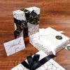 Suministro Exclusivo Transfronterizo de Papel de Regalo Blanco con Corazones Estampados en Dorado para San Valentín y Papel de Regalo con Estrellas para Cumpleaños