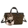 Bolso único de gamuza con estampado de leopardo para mujer, nuevo bolso cruzado versátil otoño/invierno 2026, bolso de cubo de mano exquisito y súper popular