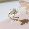 Pulsera de anillo abierto de alta calidad con anillo giratorio europeo y americano con microincrustaciones de circonitas, elegante, combinable con diamantes redondos y forma de flor pequeña.