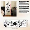 Nuevo adhesivo de espejo de cristal de vid de flor de mariposa minimalista negro transfronterizo para decoración de baño en casa, calcomanía de pared autoadhesiva