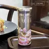 Taza de titanio puro de alta calidad, ligera y elegante para mujer; una taza creativa de bolsillo con interior y exterior de titanio puro; una taza mini de titanio portátil para estudiantes
