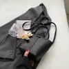 Bolso de Diseño Nicho para Mujer 2024 Nuevo Estilo Coreano Ins Moderno Casual Versátil Bolso de Hombro o Axila Estilo Cubo
