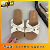 Chanclas Planas Casuales con Zapatos de Falda para Mujer Ropa de Exterior de Verano 2025 Nuevo Estilo de Centro Turístico Costero Sandalias de Tira Cruzada