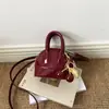 Superficie de Espejo Moda de Primavera 2026 Elegante Mini Simple Versátil Personalidad Bolso Cruzado al Hombro Bolso Tipo Concha