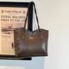 Bolso tote de hombro vintage versátil de gran capacidad para mujer, nuevo otoño e invierno 2026, casual, simple, de alta gama