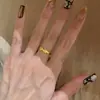 Anillo Popular de Xiaohongshu con Puntos de Diamantes Cepillados Jixiang para Mujer Diseño de Nicho Único Elegante Anillo para Dedo Índice Dropshipping