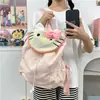 Mochila linda de gato estilo coreano, ligera, casual, versátil, adecuada para niñas, viajeros y estudiantes, una mochila de dibujos animados de moda para niños