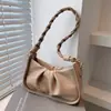 Nueva colección primavera/verano 2026: un bolso de hombro con forma de nube, elegante y versátil, perfecto para llevar debajo del brazo, con un diseño de alta gama y único