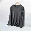 Camiseta de manga larga de otoño, capa base talla grande, cuello redondo para hombre, top simple y holgado, estilo coreano, camiseta estampada de moda