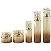 Set de frascos de loción para el cuidado de la piel botellas vacías en stock 30g tapa acrílica giratoria frasco de crema transparente spray degradado OEM