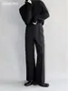 Pantalones de vestir casuales negros holgados y fluidos con forro de polar para otoño e invierno, modernos y duraderos, ligeramente acampanados, de longitud extendida