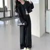Conjunto de alta gama estilo coreano negro para mujer, nueva colección otoño 2026, con una chaqueta retro de cuello redondo y pantalones de pierna ancha, un conjunto de dos piezas