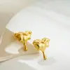 Pendientes de corazón cruzado Europa y Estados Unidos combinación de colores oro y plata joyería para orejas de estilo mecánico de lujo ligero de alta gama con forma de corazón de amor