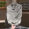 Primavera, Otoño e Invierno 2025 Suéter Versátil de Moda Top con Letra de Acero Manga Larga para Hombre Sudadera Gruesa Casual de Moda