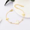 Pulsera mariposa concha blanca de Corea del Sur acero titanio hueco tridimensional chapado color conservante joyería de moda lote directo de fábrica