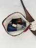 Nueva Bolsa de Cosméticos Retro de Nicho de Brocado de Gran Capacidad Bolsa de Lavar Portátil para Salir Bolsa de Lápices Texturizada