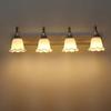 Lámpara delantera de espejo de estilo europeo al por mayor Lámpara LED de baño americana Lámpara de pared para espejo de baño tocador impermeable boca de rosca E14 gratis