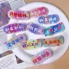 Clips Mixtos al por Mayor de un Dólar de Moda Populares Pasadores Infantiles de Dibujos Animados Lindos Accesorios para el Cabello de Puesto de Exposición del Mercado Nocturno