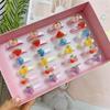 Anillo luminoso para niños japoneses y coreanos con dibujos de frutas, melocotón, corazón roto, diamante rojo y azul, anillo de destello, juguete, caja de regalo navideña