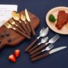 Vajilla de acero inoxidable estilo ins con mango de madera de imitación, cuchillo y tenedor para carne, juego de cuatro piezas, cuchillo y tenedor con veta de madera, cuchara chapada en oro para hotel.