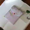 Muestra de pedido final se puede pedir bolsa de tela de brocado para regalo bolsa Wenwan estilo japonés bolsa de almacenamiento de joyas billetera plegable tela