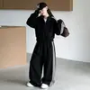 Conjunto de cárdigan de punto estilo americano para niñas con bloques de color, nueva colección otoño 2026, conjunto casual de dos piezas para niños con pantalones de pierna ancha