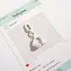 Novo Chaveiro Pingente de Fone de Ouvido de Liga Metálica Pintado com Desenho Animado Fofo Pingente de Bolsa Pequeno Presente Carro Pequeno Livro Vermelho
