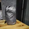 Bolsillo con cordón de poliéster al por mayor Bolsa impermeable con cordón de nailon Bolsa de almacenamiento para ropa Bolsa de almuerzo de viaje Bolsillo encogido
