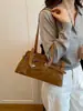 Bolso de axila retro de alta gama para mujer, nuevo bolso de mano de moda tendencia 2026, bolso de hombro de gran capacidad para el día a día, bolso baguette