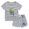 Conjunto de Camiseta e Shorts de Gola Redonda de Verão 2026 para Crianças Estilo Coreano Casual Absorvente de Suor Cor Doce Conjunto de Moletom para Crianças Pequenas